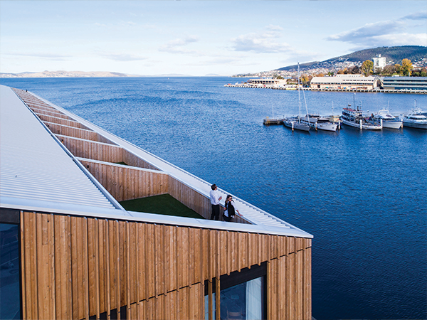 An aerial shot of a terrace overlooking the Hobart harbour at MACq 01 Hotel.
