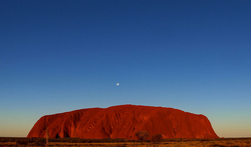 A solar eclipse will be visible above Uluṟu – how to time your trip