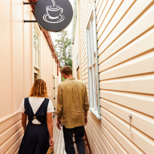 A couple at Bastion Lane Espresso in the Tweed town of Uki