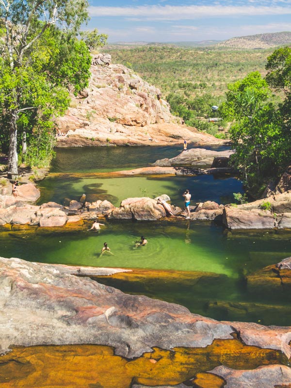 People swimming in Gunlom Falls