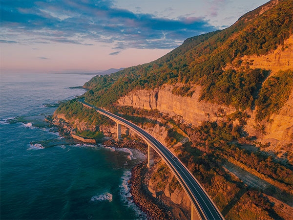 The scenic coastal drive along Sea Cliff Bridge, Clifton.