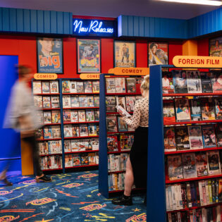 A full-scale replica of a 90s video store.