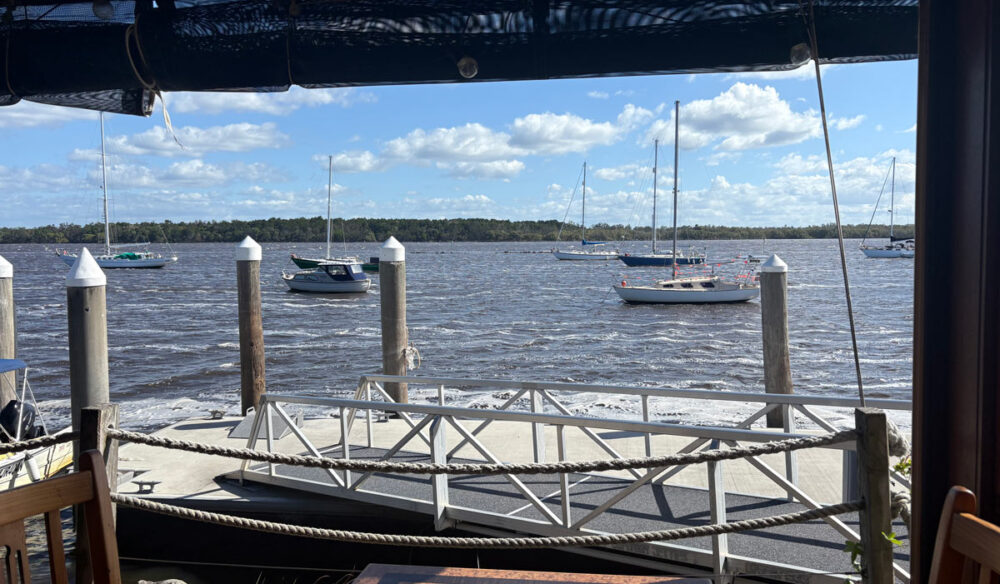View of the water from inside Chez Basho Boatshed Cafe in Iluka
