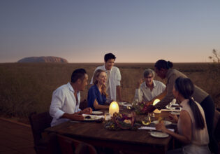 A table of people dining at Tali Wiṟu in Uluṟu
