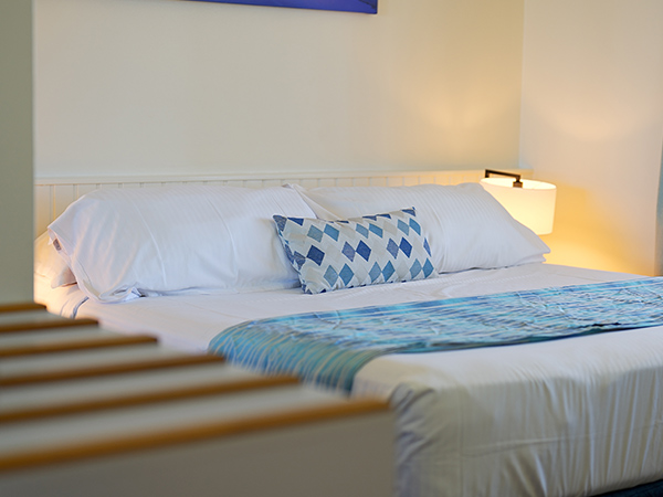 bed in K'gari Beach Resort Resort Room