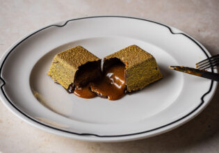 Luke's Golden Chocolate Bar dessert after it's been cut open at Luke's Kitchen Sydney