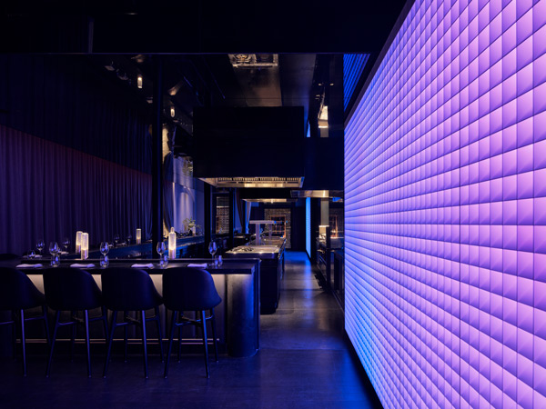 the moody and neon-lit interior of Garaku, best Japanese restaurant Sydney