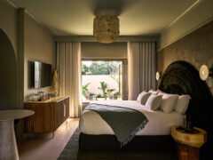 A green coloured room at Swell Hotel Byron Bay