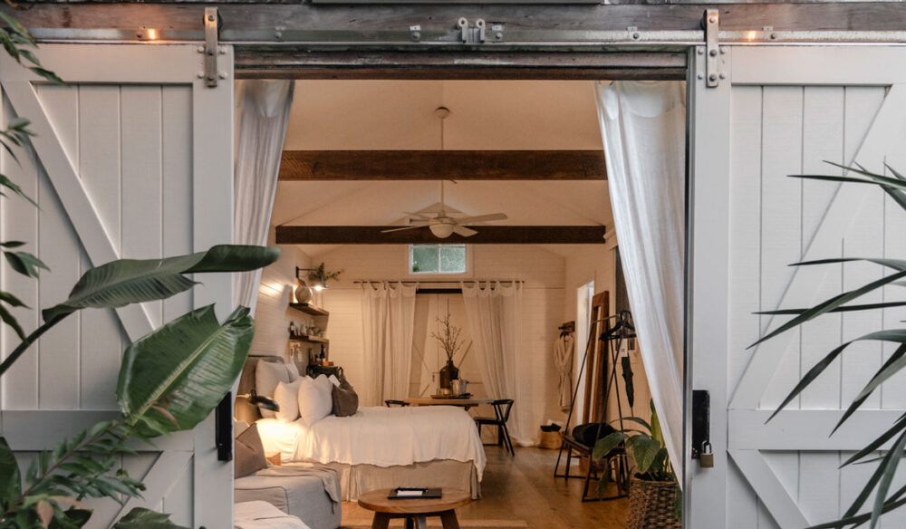 the white-washed cottage at The Bower Byron Bay