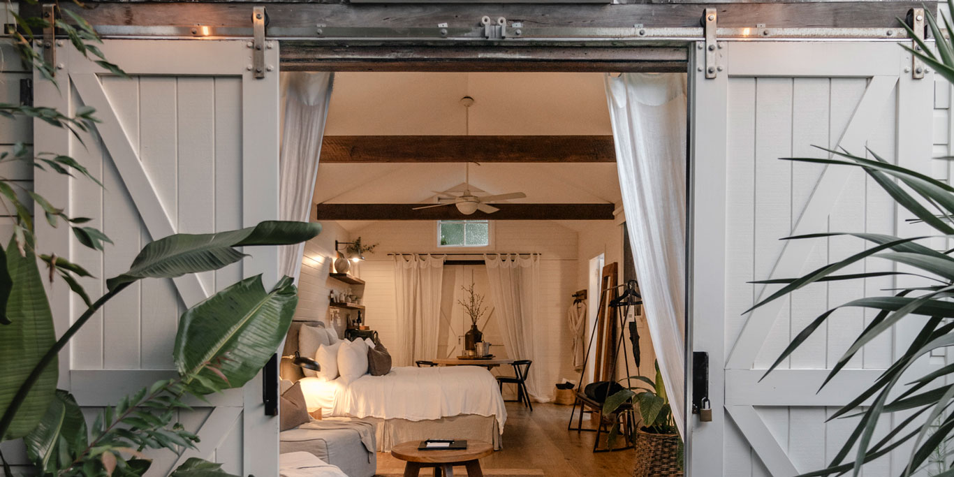 the white-washed cottage at The Bower Byron Bay