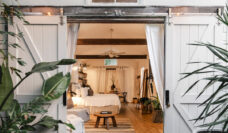 the white-washed cottage at The Bower Byron Bay